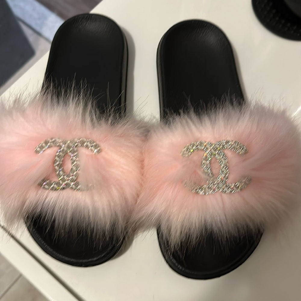 Pink fur slides w/Coco Chanel on fur